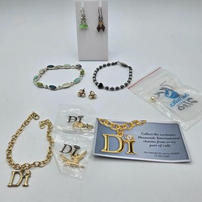 LOT 57: Assortment of Bracelets, Earrings, and Charms