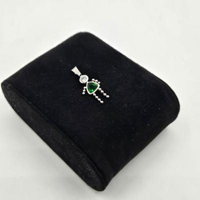 LOT 59: 14k White Gold Charm/0.7gtw