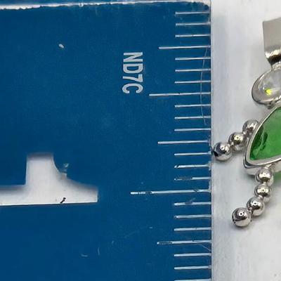 LOT 59: 14k White Gold Charm/0.7gtw