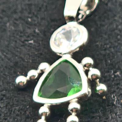 LOT 59: 14k White Gold Charm/0.7gtw