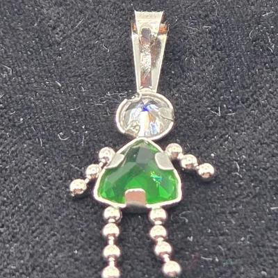 LOT 59: 14k White Gold Charm/0.7gtw