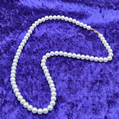 LOT 62: Variety of Faux Pearl Neclaces and More