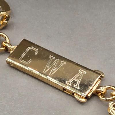 LOT 63: Dragonfly Pin, Hand-Painted Cardinal Pin with Matching Earrings, Gold-tone Avon Bracelet, and More