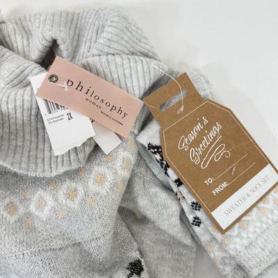 LOT 82: Women's Winter Outfits: Pair of 2XL Sweaters, Size Large Black Leggings & Nine West Pants (size 12)