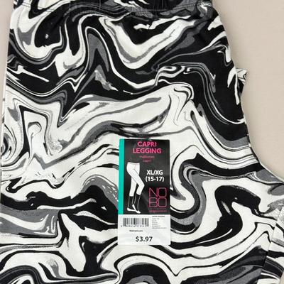 LOT 85: Vintage Shania Twain Tour Shirt, Size 6Y Nike Sneakers & More