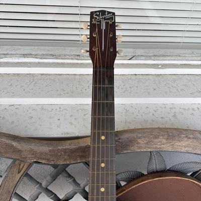 LOT 94: Small Silvertone Guitar w/ Vintage Cowboy Guitar Case