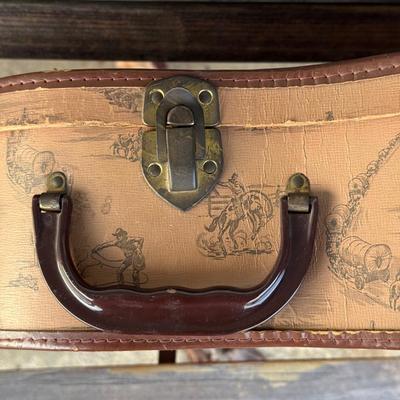 LOT 94: Small Silvertone Guitar w/ Vintage Cowboy Guitar Case