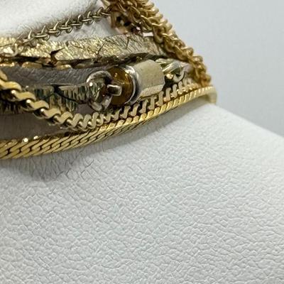 LOT 99: Gold Tone Necklace Collection - various lengths