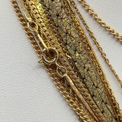 LOT 99: Gold Tone Necklace Collection - various lengths