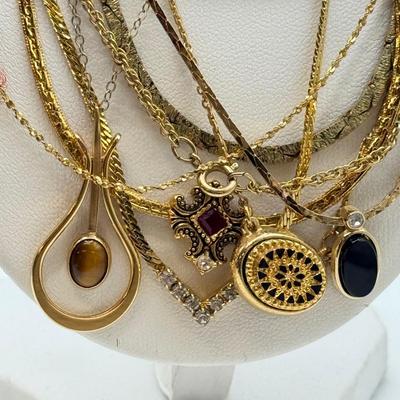 LOT 99: Gold Tone Necklace Collection - various lengths