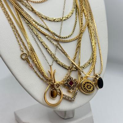 LOT 99: Gold Tone Necklace Collection - various lengths