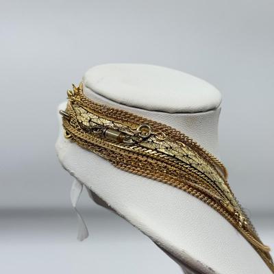 LOT 99: Gold Tone Necklace Collection - various lengths