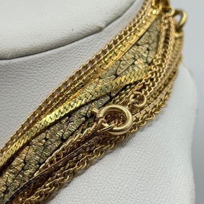 LOT 99: Gold Tone Necklace Collection - various lengths