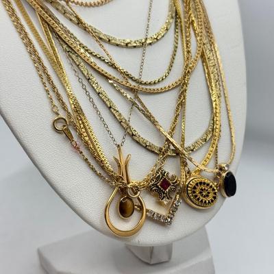 LOT 99: Gold Tone Necklace Collection - various lengths