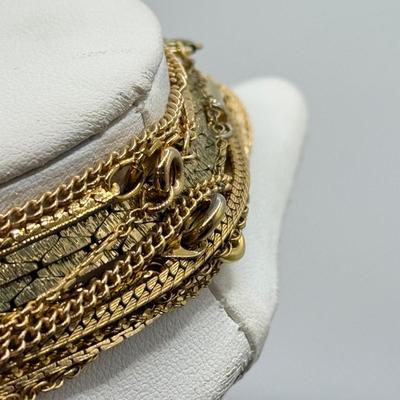 LOT 99: Gold Tone Necklace Collection - various lengths