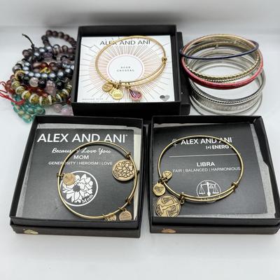 LOT 100: Alex and Ani Charm Bracelets w/ Boxes, Bangles & Beaded Bracelets