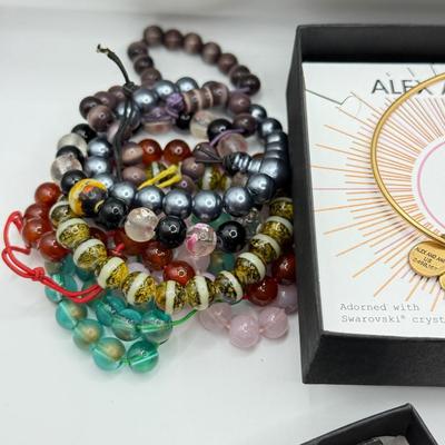 LOT 100: Alex and Ani Charm Bracelets w/ Boxes, Bangles & Beaded Bracelets