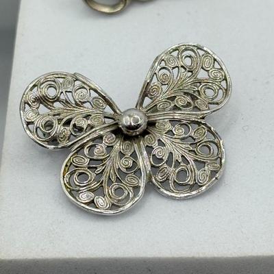 LOT 103: Collection of Silvertone Pins & Pierced Earrings