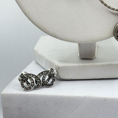 LOT 105: Avon Sterling and Glass Ring (sz 9), Avon Earrings in Box, Faux Marcasite Pieces & More