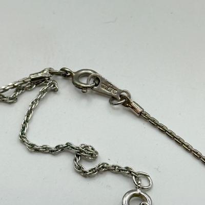 LOT 105: Avon Sterling and Glass Ring (sz 9), Avon Earrings in Box, Faux Marcasite Pieces & More