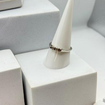 LOT 105: Avon Sterling and Glass Ring (sz 9), Avon Earrings in Box, Faux Marcasite Pieces & More