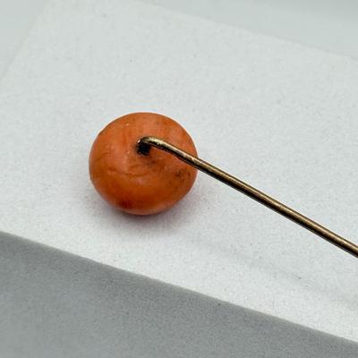 LOT 115: 14k Gold Hat / Stick Pin w/ Round Coral Stone(2.6g)