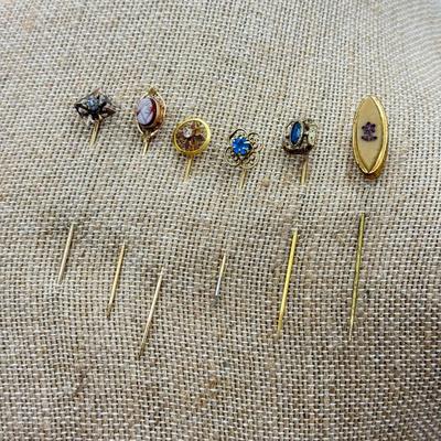 LOT 119: Vintage Hat / Stick Pins: Floral & Cameo Designs