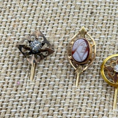 LOT 119: Vintage Hat / Stick Pins: Floral & Cameo Designs