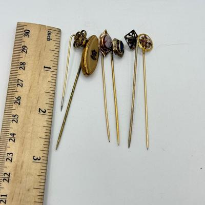 LOT 119: Vintage Hat / Stick Pins: Floral & Cameo Designs