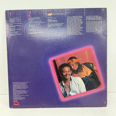 LOT 128: Vinyl Record Albums: Donna Summer, Dionne Warwick, Stevie Wonder, Nat King Cole & More
