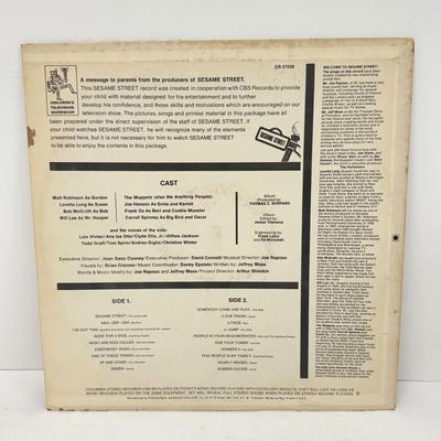 LOT 131: Hercules Disney on Ice Memorabilia w/ Collection of Children's Vinyl Records: Original Sesame Street Cast Recording, Bozo...