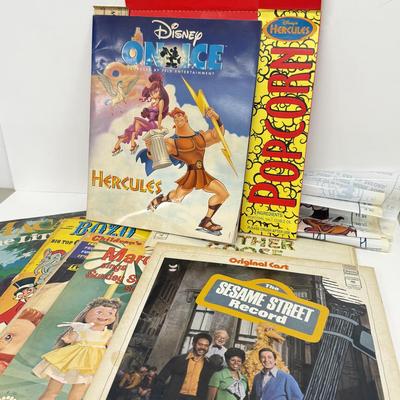 LOT 131: Hercules Disney on Ice Memorabilia w/ Collection of Children's Vinyl Records: Original Sesame Street Cast Recording, Bozo...