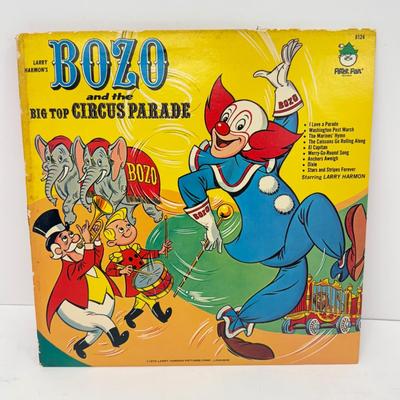 LOT 131: Hercules Disney on Ice Memorabilia w/ Collection of Children's Vinyl Records: Original Sesame Street Cast Recording, Bozo...