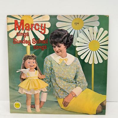 LOT 131: Hercules Disney on Ice Memorabilia w/ Collection of Children's Vinyl Records: Original Sesame Street Cast Recording, Bozo...