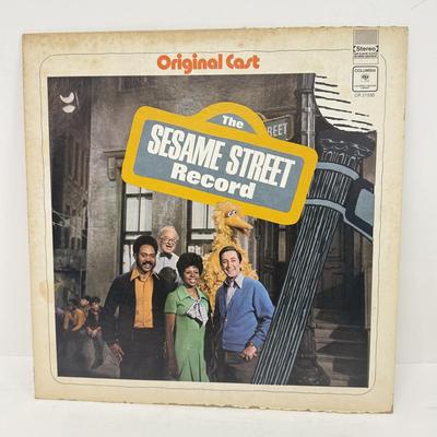 LOT 131: Hercules Disney on Ice Memorabilia w/ Collection of Children's Vinyl Records: Original Sesame Street Cast Recording, Bozo...