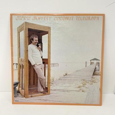 LOT 133: Jimmy Buffett Vinyl Record Albums: Floridays, Changes in Latitudes / Changes in Attitudes, Volcano, A1A, Coconut Telegraph, Last...