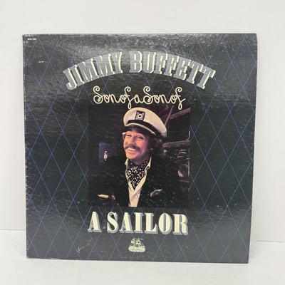 LOT 133: Jimmy Buffett Vinyl Record Albums: Floridays, Changes in Latitudes / Changes in Attitudes, Volcano, A1A, Coconut Telegraph, Last...