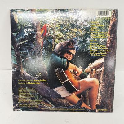 LOT 133: Jimmy Buffett Vinyl Record Albums: Floridays, Changes in Latitudes / Changes in Attitudes, Volcano, A1A, Coconut Telegraph, Last...