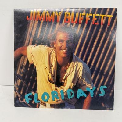 LOT 133: Jimmy Buffett Vinyl Record Albums: Floridays, Changes in Latitudes / Changes in Attitudes, Volcano, A1A, Coconut Telegraph, Last...