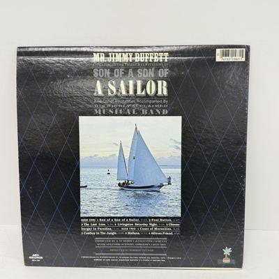 LOT 133: Jimmy Buffett Vinyl Record Albums: Floridays, Changes in Latitudes / Changes in Attitudes, Volcano, A1A, Coconut Telegraph, Last...