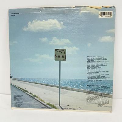 LOT 133: Jimmy Buffett Vinyl Record Albums: Floridays, Changes in Latitudes / Changes in Attitudes, Volcano, A1A, Coconut Telegraph, Last...