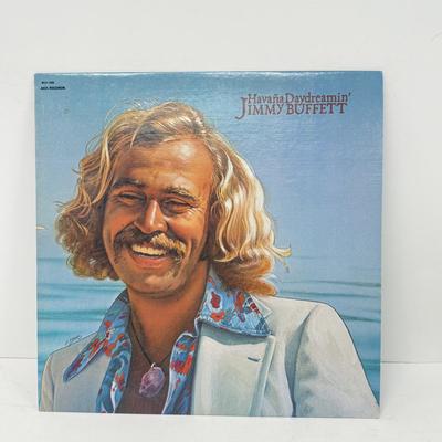LOT 133: Jimmy Buffett Vinyl Record Albums: Floridays, Changes in Latitudes / Changes in Attitudes, Volcano, A1A, Coconut Telegraph, Last...