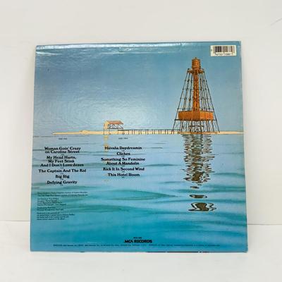 LOT 133: Jimmy Buffett Vinyl Record Albums: Floridays, Changes in Latitudes / Changes in Attitudes, Volcano, A1A, Coconut Telegraph, Last...