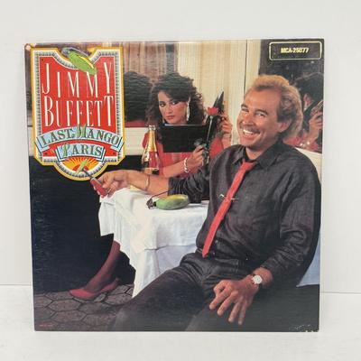 LOT 133: Jimmy Buffett Vinyl Record Albums: Floridays, Changes in Latitudes / Changes in Attitudes, Volcano, A1A, Coconut Telegraph, Last...