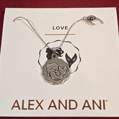 LOT 146: Silver-tone Bangle Bracelets with Charms, Alex and Ani Necklace, and Premier Designs White Hot Watch