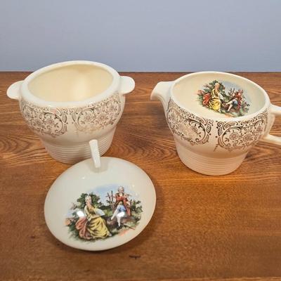 LOT 151: Vintage Sebring Pottery Chantilly Dinnerware/ 8 Dinner Plates, 8 Soup Bowls, 4 Dessert Plates, 4 Dessert Bowls, and Creamer...