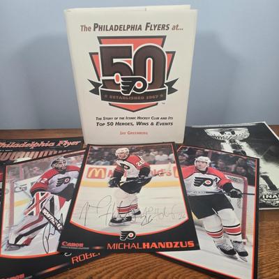 LOT 154: The Philadelphia Flyers at 50 Book, Official Game Program of the 2010 Stanley Cup Final and Players' Signed Photos &...