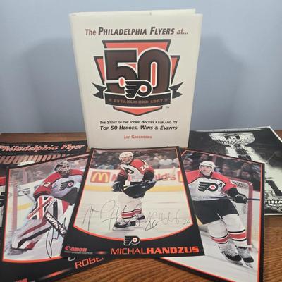 LOT 154: The Philadelphia Flyers at 50 Book, Official Game Program of the 2010 Stanley Cup Final and Players' Signed Photos &...