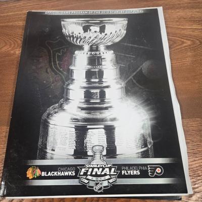 LOT 154: The Philadelphia Flyers at 50 Book, Official Game Program of the 2010 Stanley Cup Final and Players' Signed Photos &...