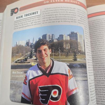 LOT 154: The Philadelphia Flyers at 50 Book, Official Game Program of the 2010 Stanley Cup Final and Players' Signed Photos &...